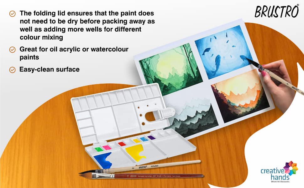BRUSTRO art set with paint mixing tray and watercolor paintings on a wooden surface.