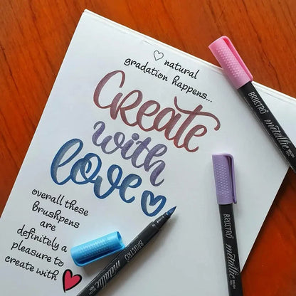 Notebook with hand-written text and colorful markers on a wooden surface