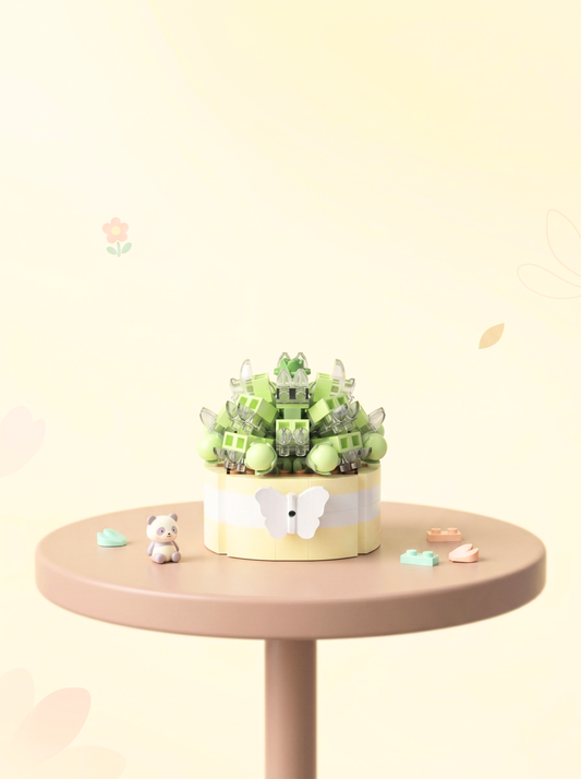 Decorative plant in a pot on a small round table with a light background
