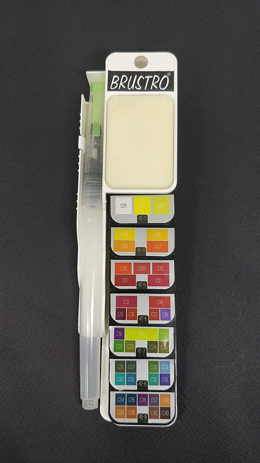 Set of watercolor paints in a BRUSTRO case on a dark background