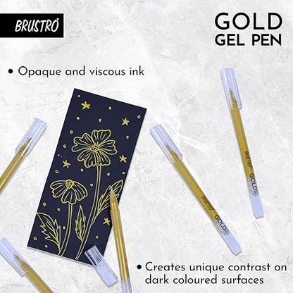 Gold gel pen with decorative notebook on a textured white background