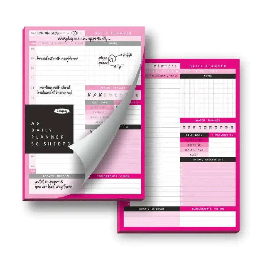 Pink daily planner with tear-off sheets on a white background