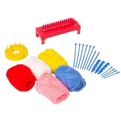 Knitting and crochet tools including yarn and needles on a white background