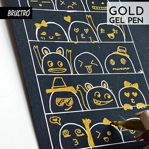 Gold gel pen drawing on a black surface with 'Brustro' branding.