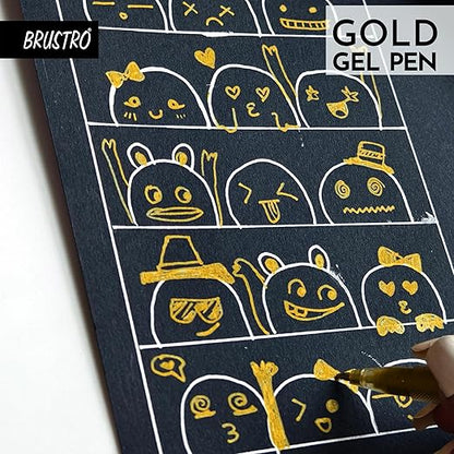Gold gel pen drawing on a black surface with 'Brustro' branding.