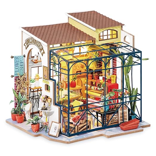 Detailed model of a flower shop with interior decor and furniture on a white background