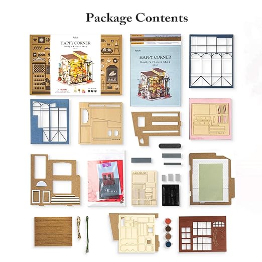 Package contents of a dollhouse kit with various parts and accessories on a white background.
