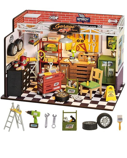 Toy garage set with various tools and furniture on a white background