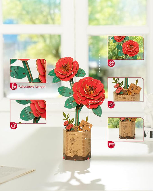 Red floral decoration with adjustable length on a white surface