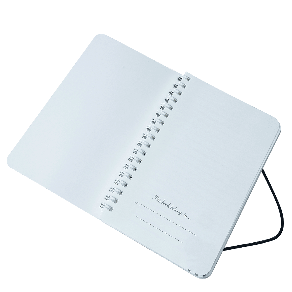 White notebook with spiral binding on a transparent background
