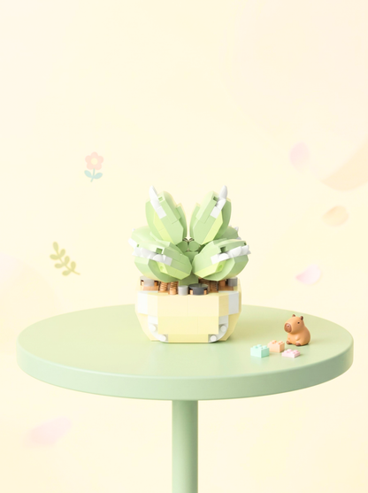 Small potted plant on a round green table with a light yellow background