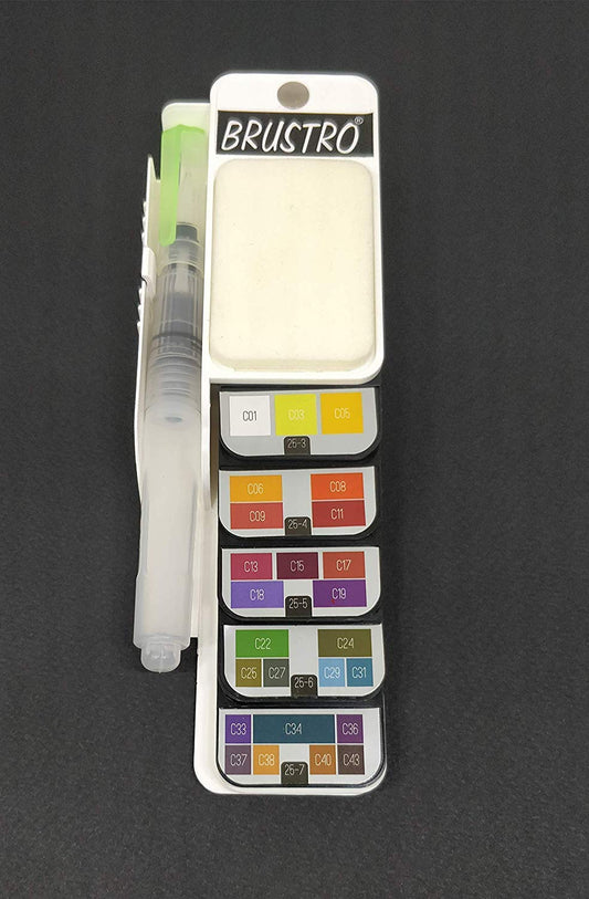 Brustro watercolor set with pan colors and a brush on a dark background
