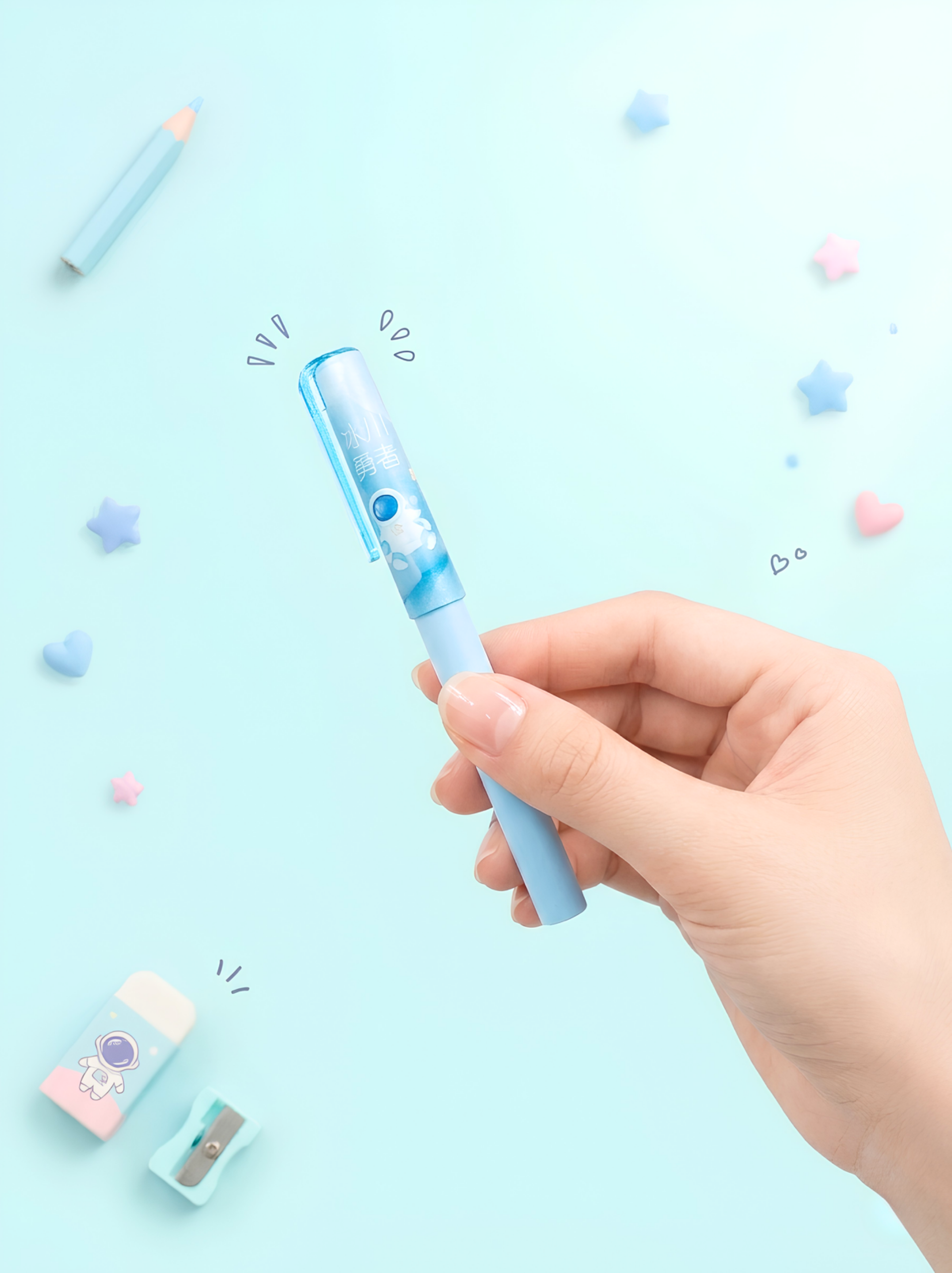 Hand holding a blue pen with a light on a light blue background