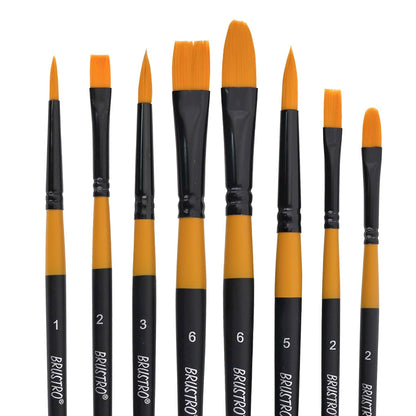 Set of paint brushes with black and orange handles on a white background