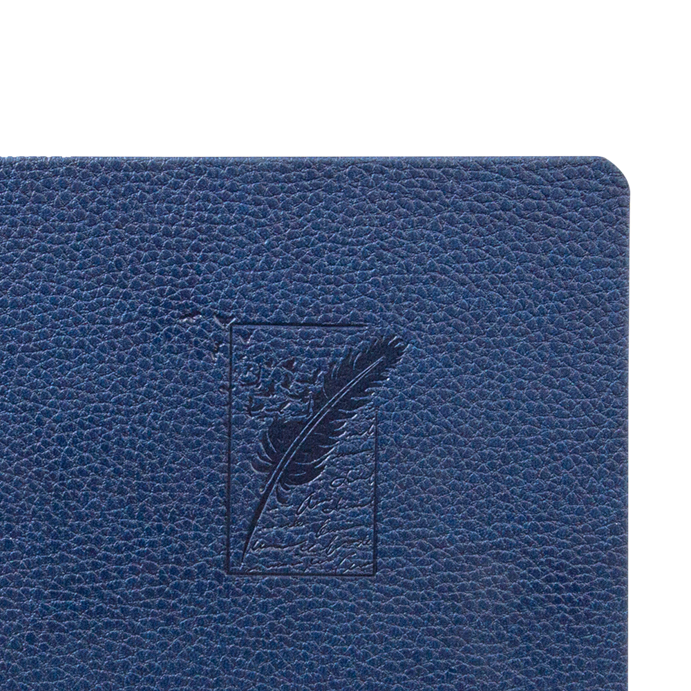 Close-up of a blue leather notebook with an embossed feather design on a white background
