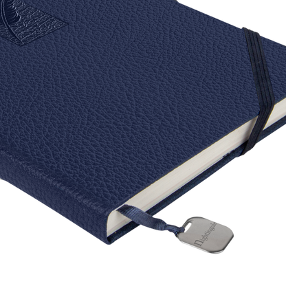 Blue textured notebook with a strap and visible brand name on a white background