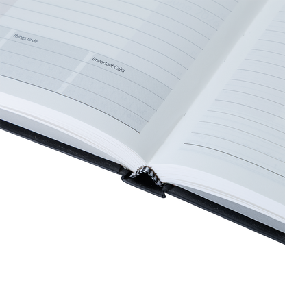 Open notebook with lined pages on a white background
