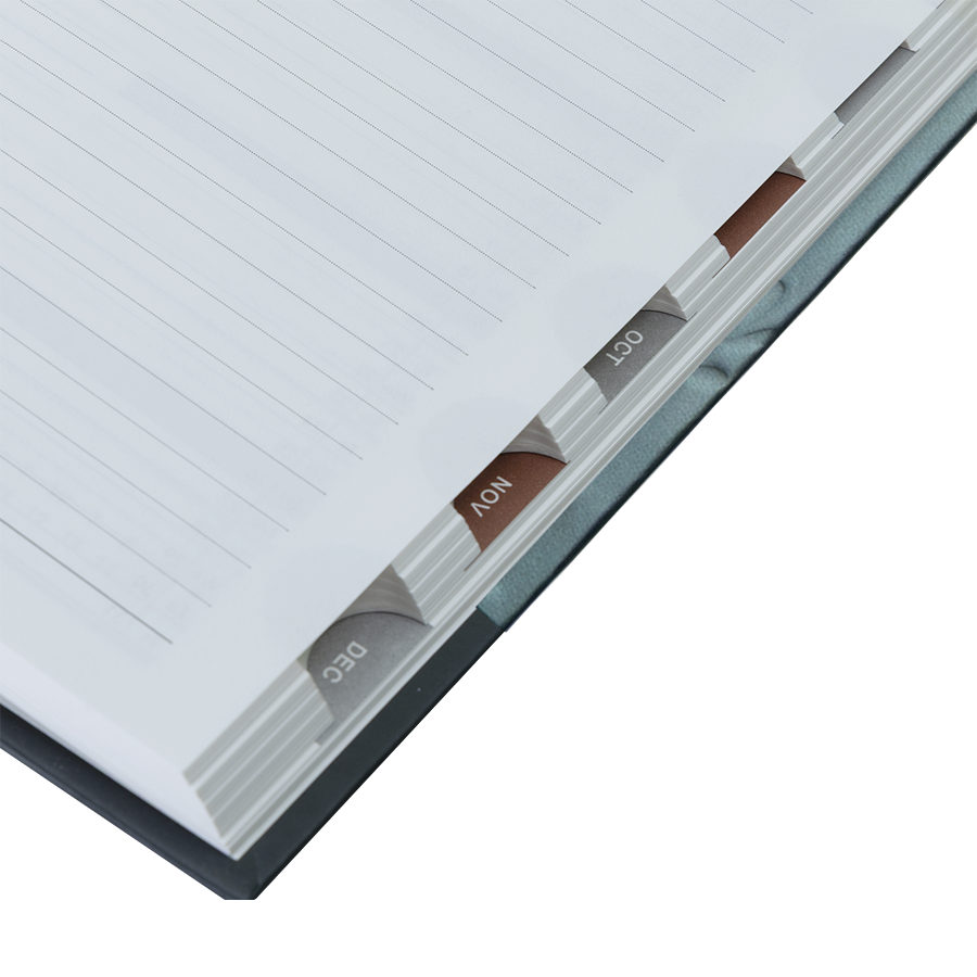 Close-up of a notebook with lined pages on a white background