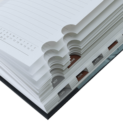 Close-up of a planner with a focus on the date and month layout.