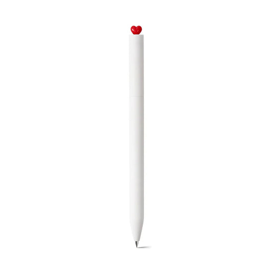 White pen with a red heart-shaped cap on a white background