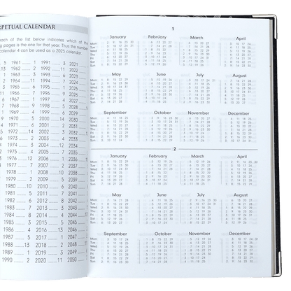 Open perpetual calendar showing multiple years on a white background