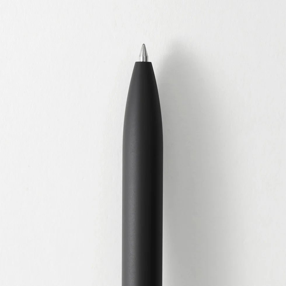 Black pen on a white background