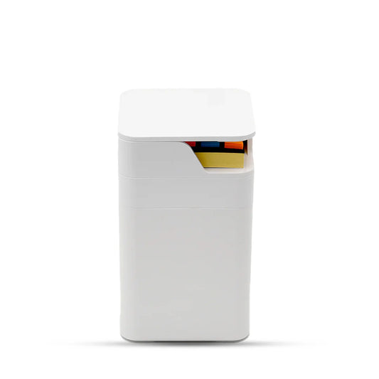 White rectangular container with colorful items inside on a white background