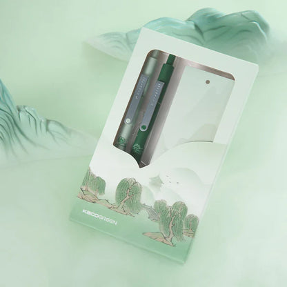 Green pen in a transparent packaging on a light green background
