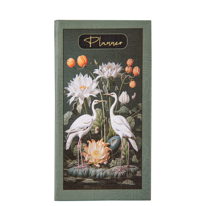 Planner with floral and bird design on a white background