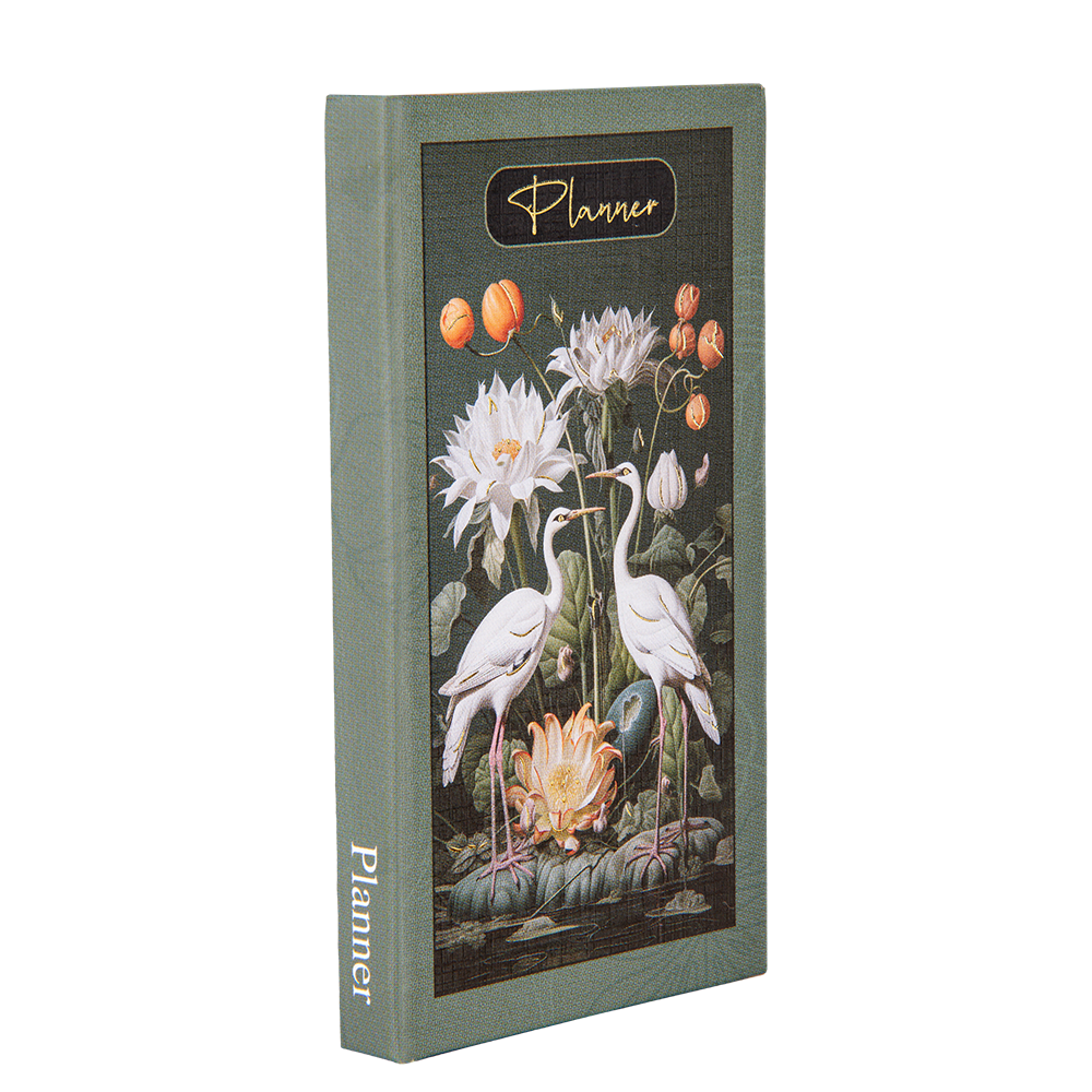 Planner with floral and bird design on a white background