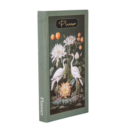 Planner with floral and bird design on a white background