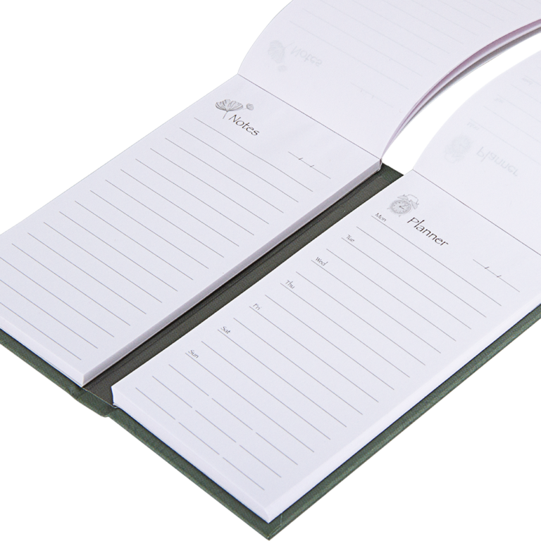 Two small notebooks labeled 'Notes' and 'Planner' on a white background