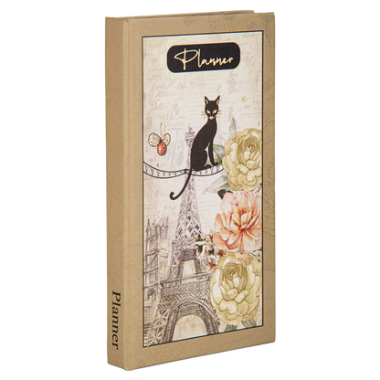 Planner with cat and floral design on a white background
