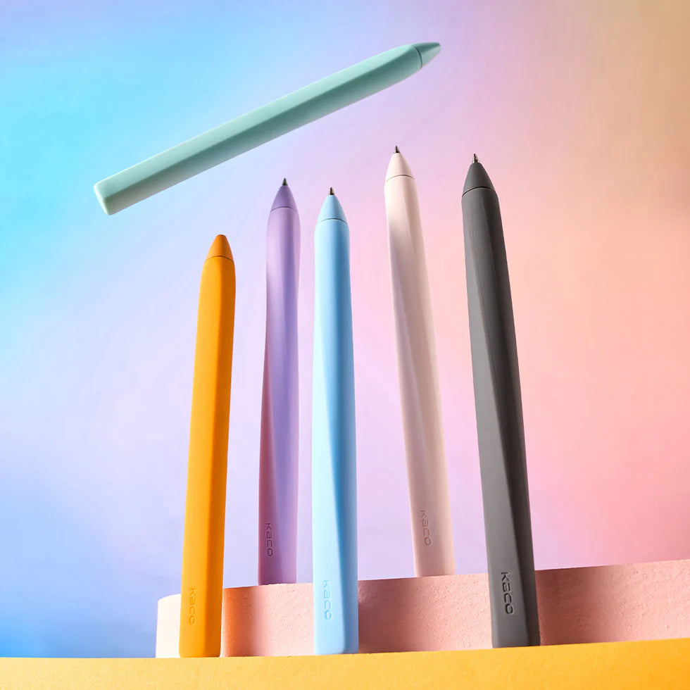 Set of colorful pens on a gradient background