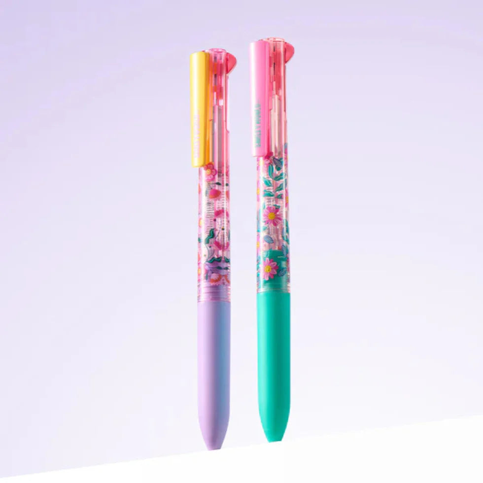 Two colorful pens with floral designs on a light purple background