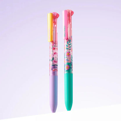 Two colorful pens with floral designs on a light purple background