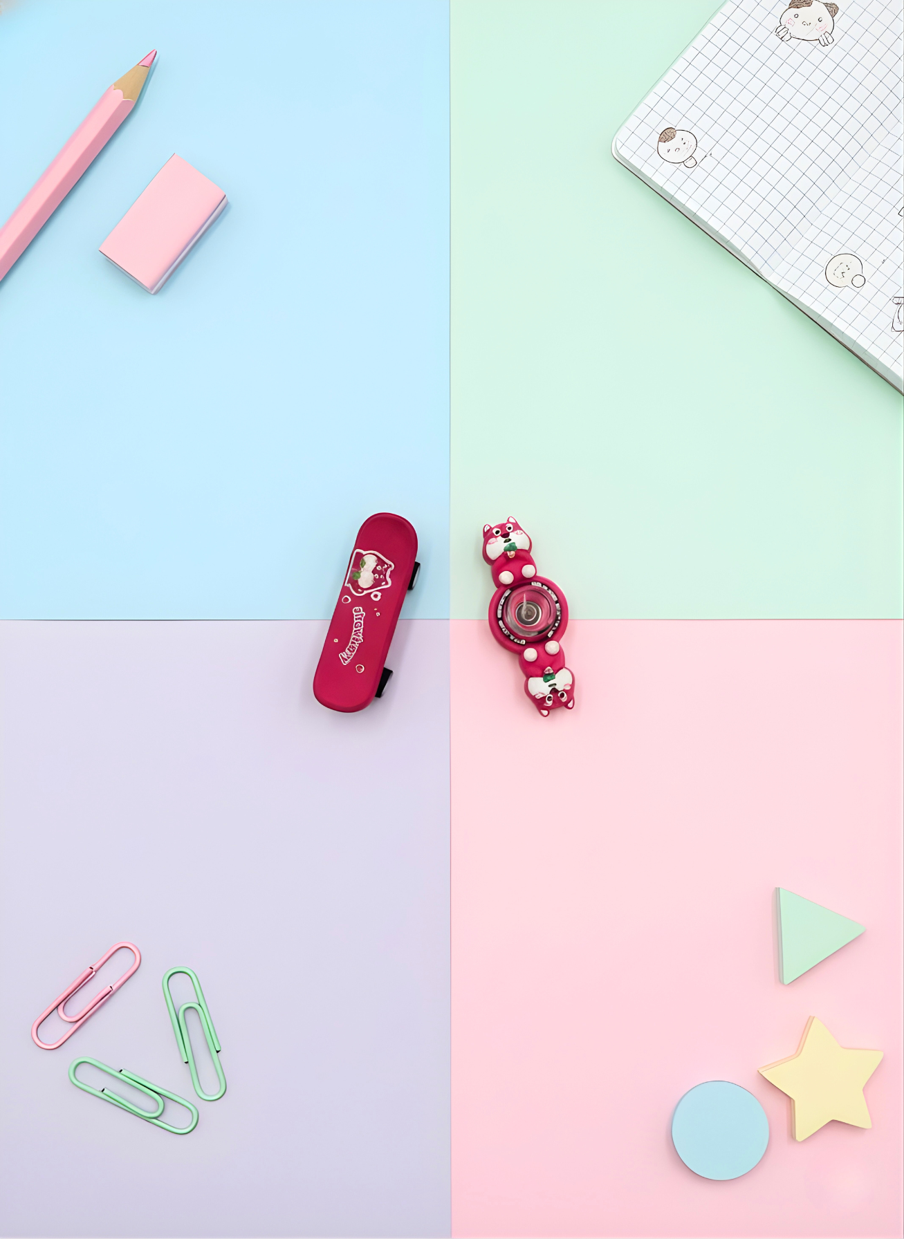 Colorful stationery items on a pastel grid background