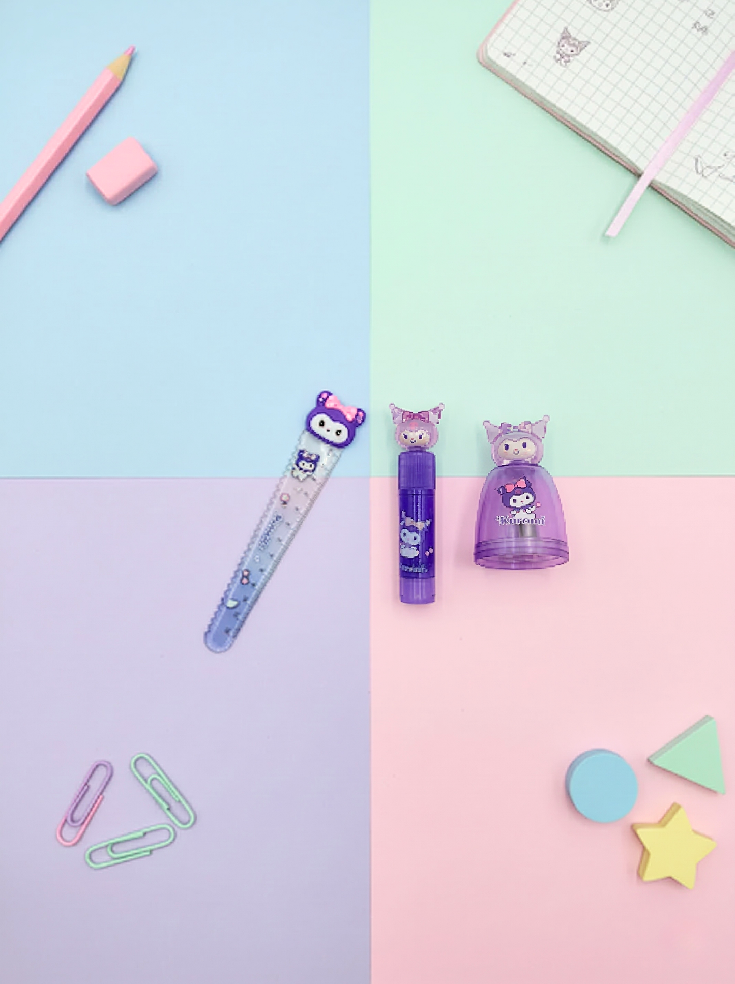 Colorful stationery items on a pastel background