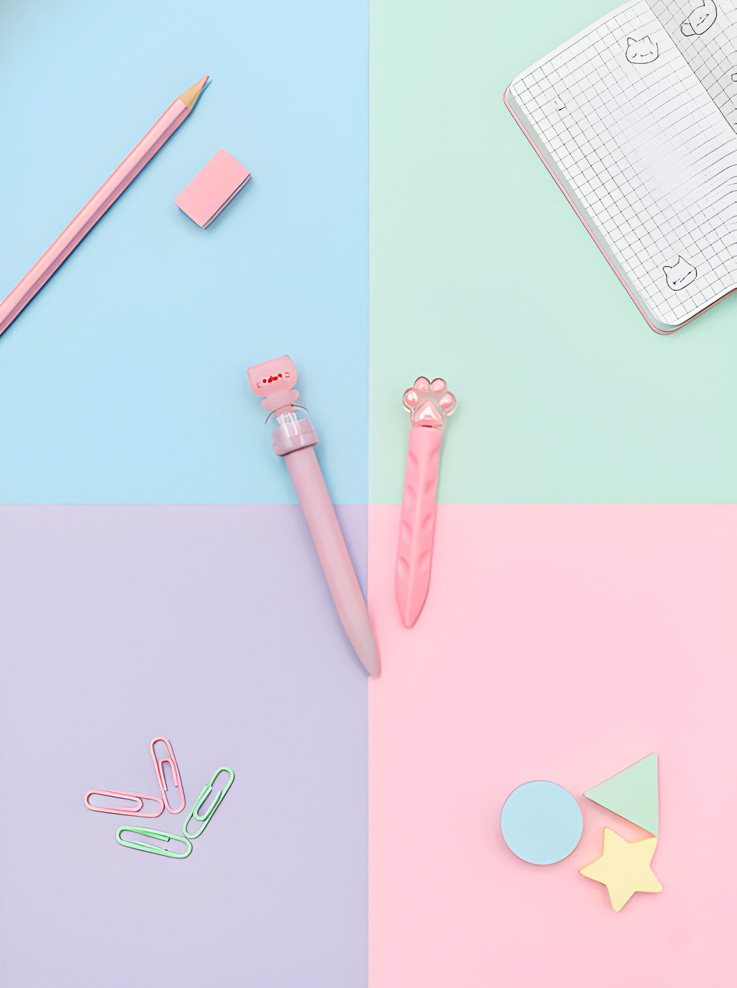 Colorful stationery items on a pastel background