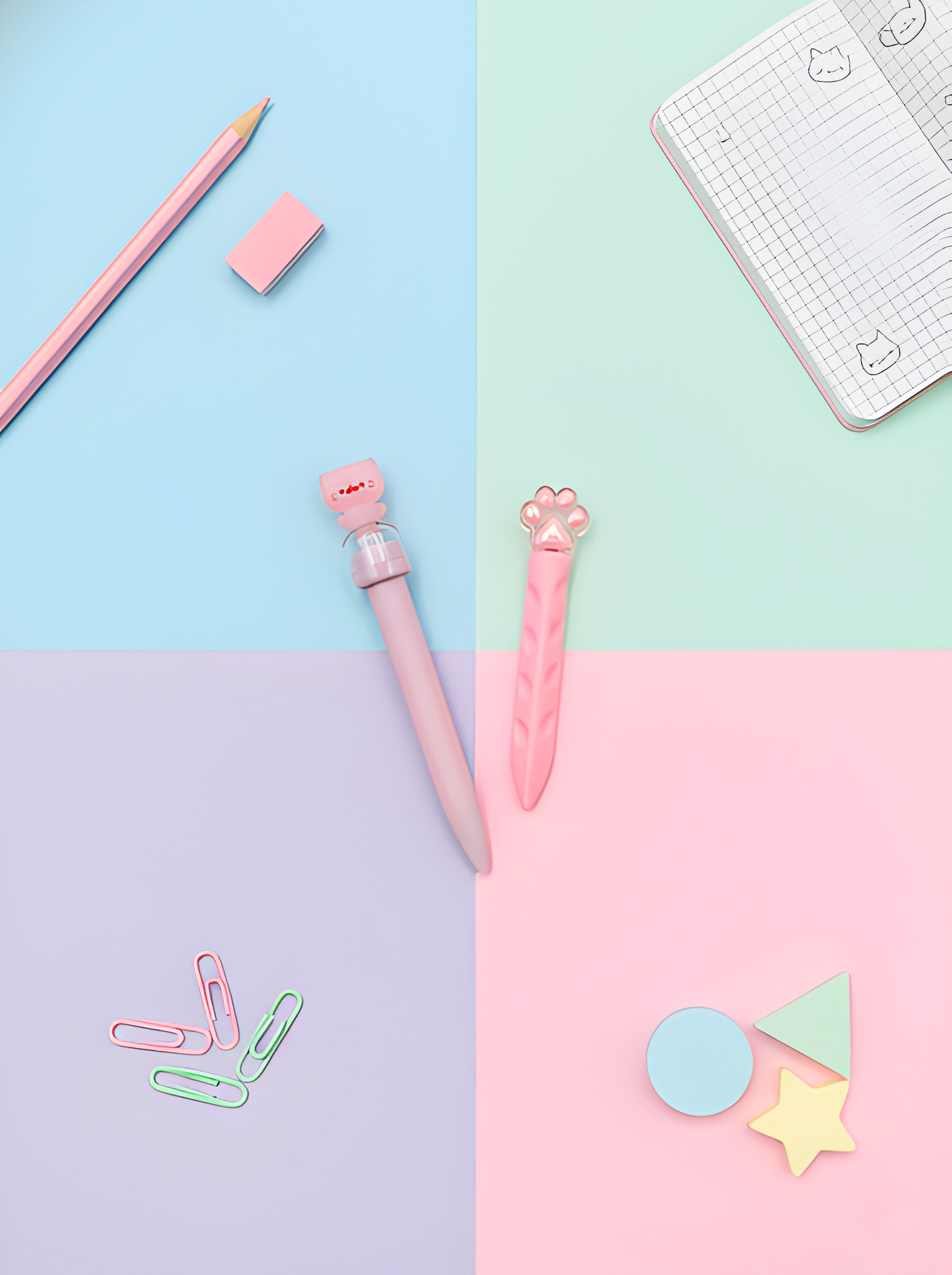 Colorful stationery items on a pastel background