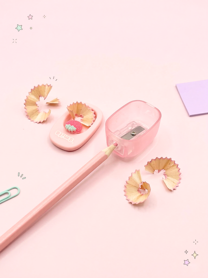 Pink pencil with sharpener and pencil shavings on a light pink background