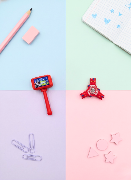 Colorful stationery items on a pastel background