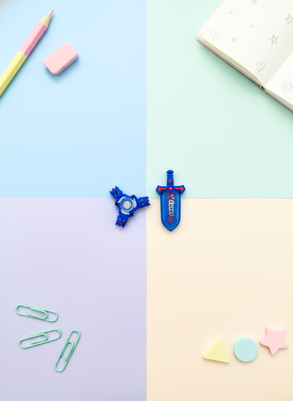 Assorted stationery items on a pastel-colored background