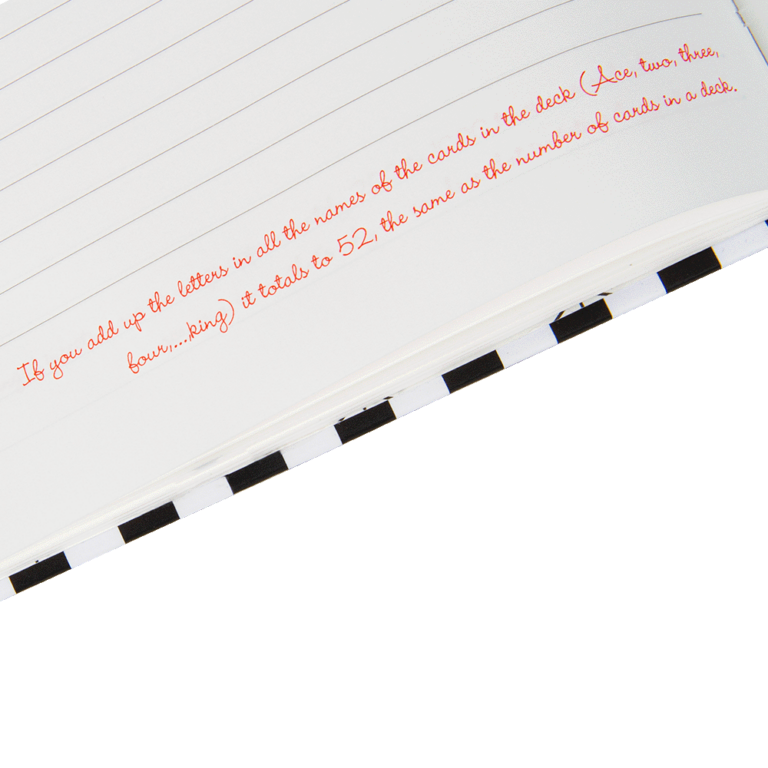 Close-up of a card with text and a black and white striped border