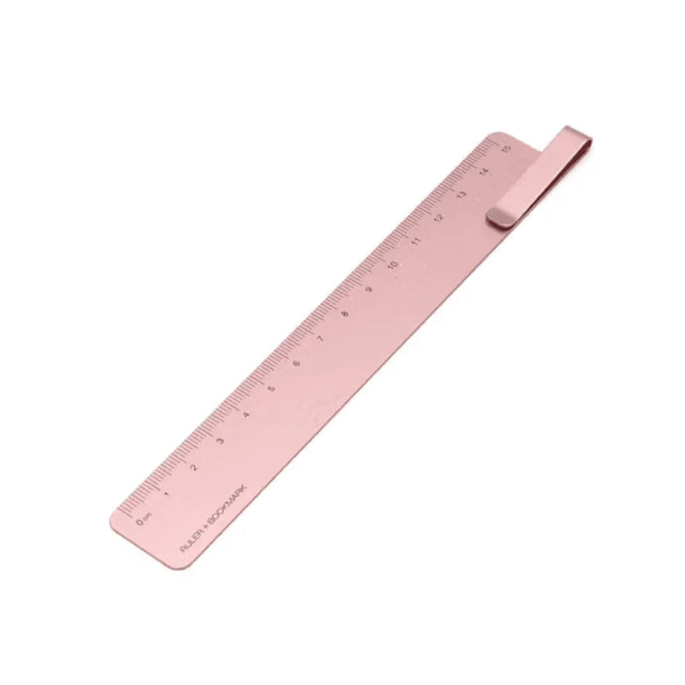 Pink ruler on a white background