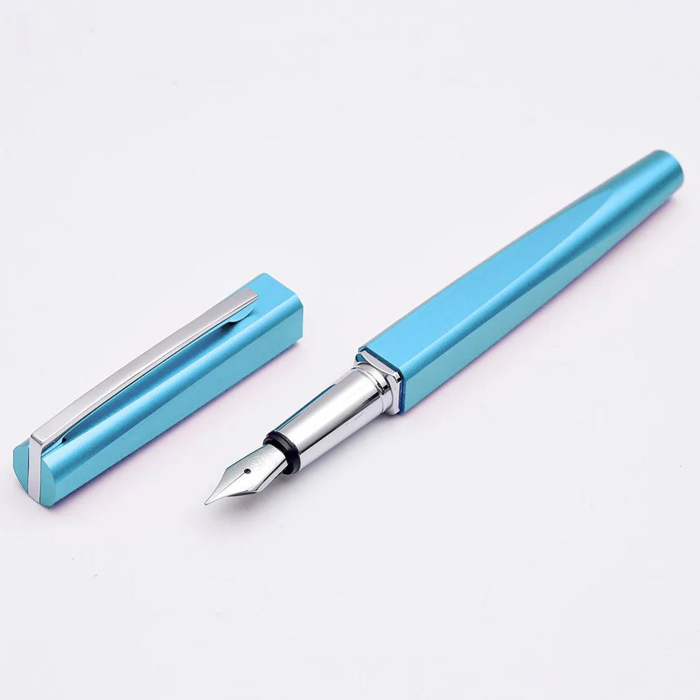 Blue fountain pen with cap on a light gray background