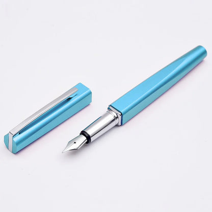 Blue fountain pen with cap on a light gray background
