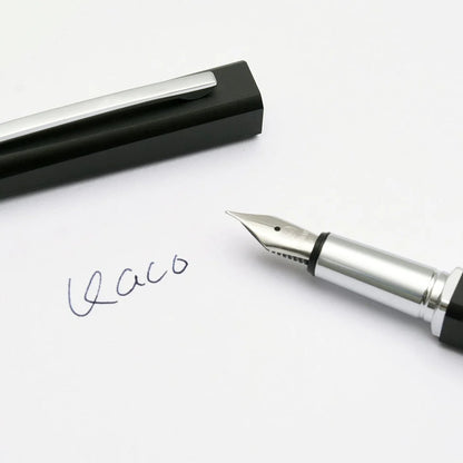 Fountain pen with cap on a white background, showing the brand name.